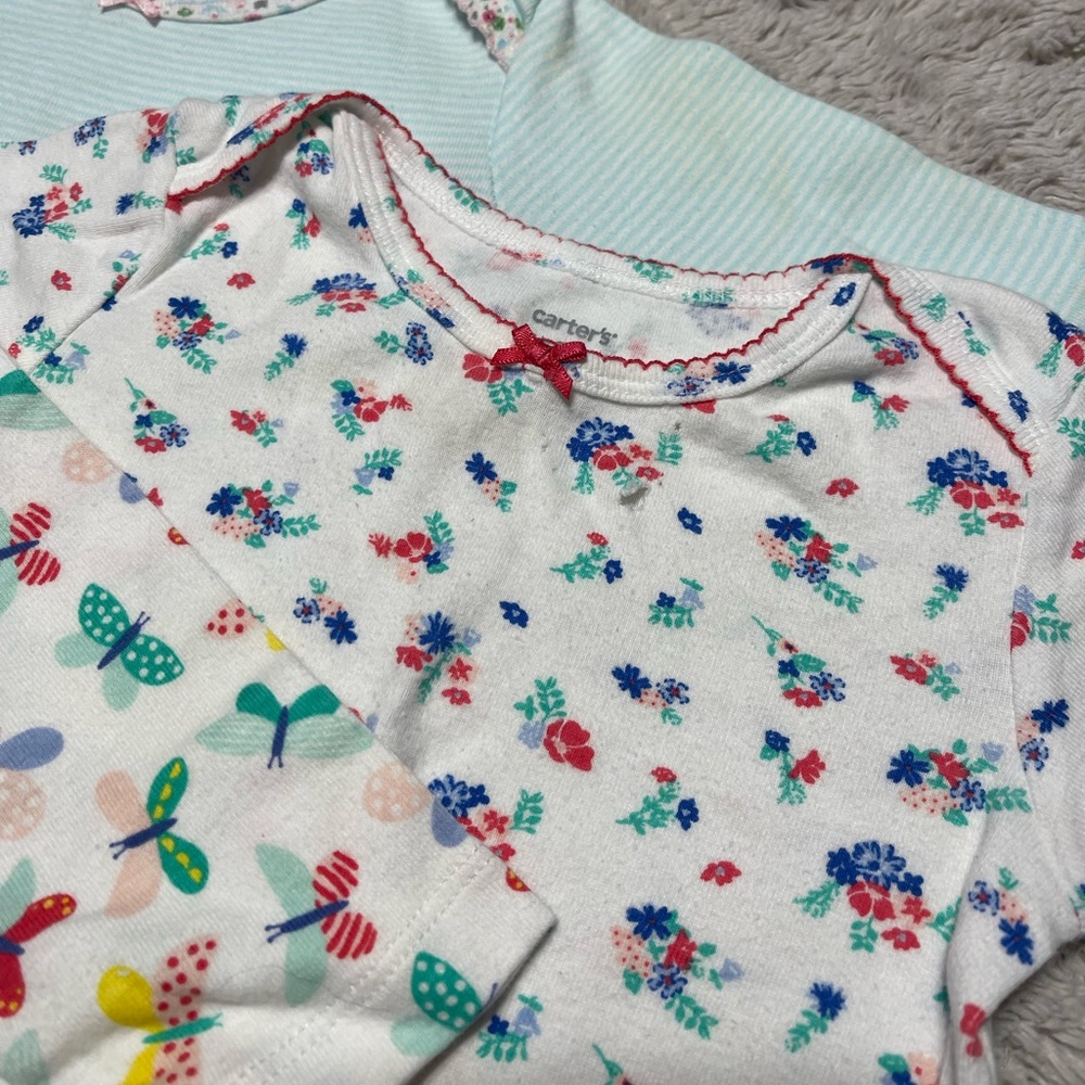 Carters 18 month long sleeve onesies. 1 with matching bottoms.